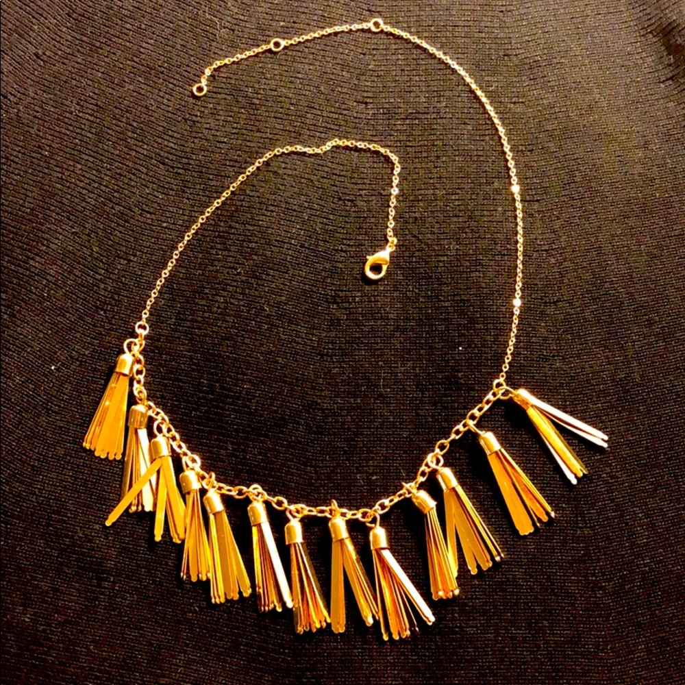 Golden necklace with tassels